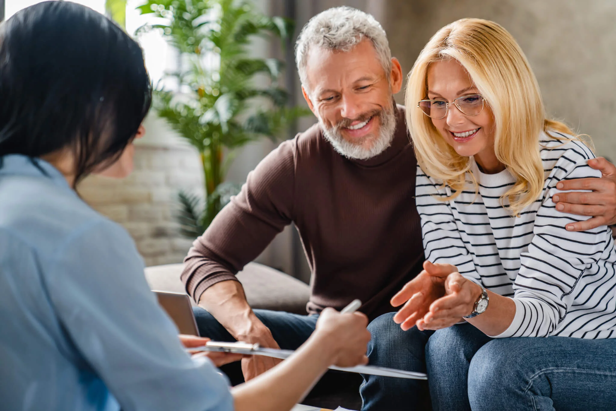 Retired couple meeting with a financial advisor