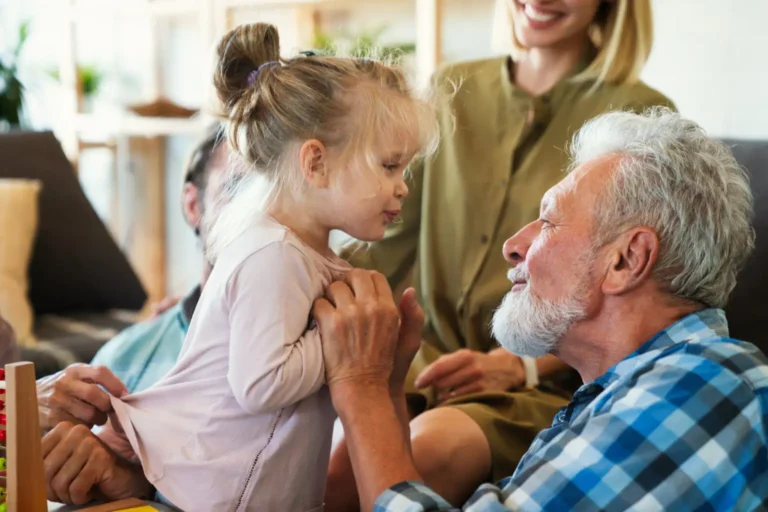 Cheerful multi-generation family having fun while spending time together at home. People happiness concept.